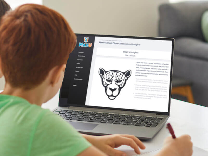 Young boy looking at computer laptop screen